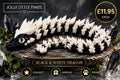 Black and white articulated 3D dragon on fantasy display background